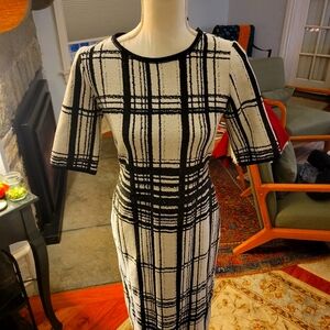 Taylor back and white dress, 3/ 4 sleeve midi